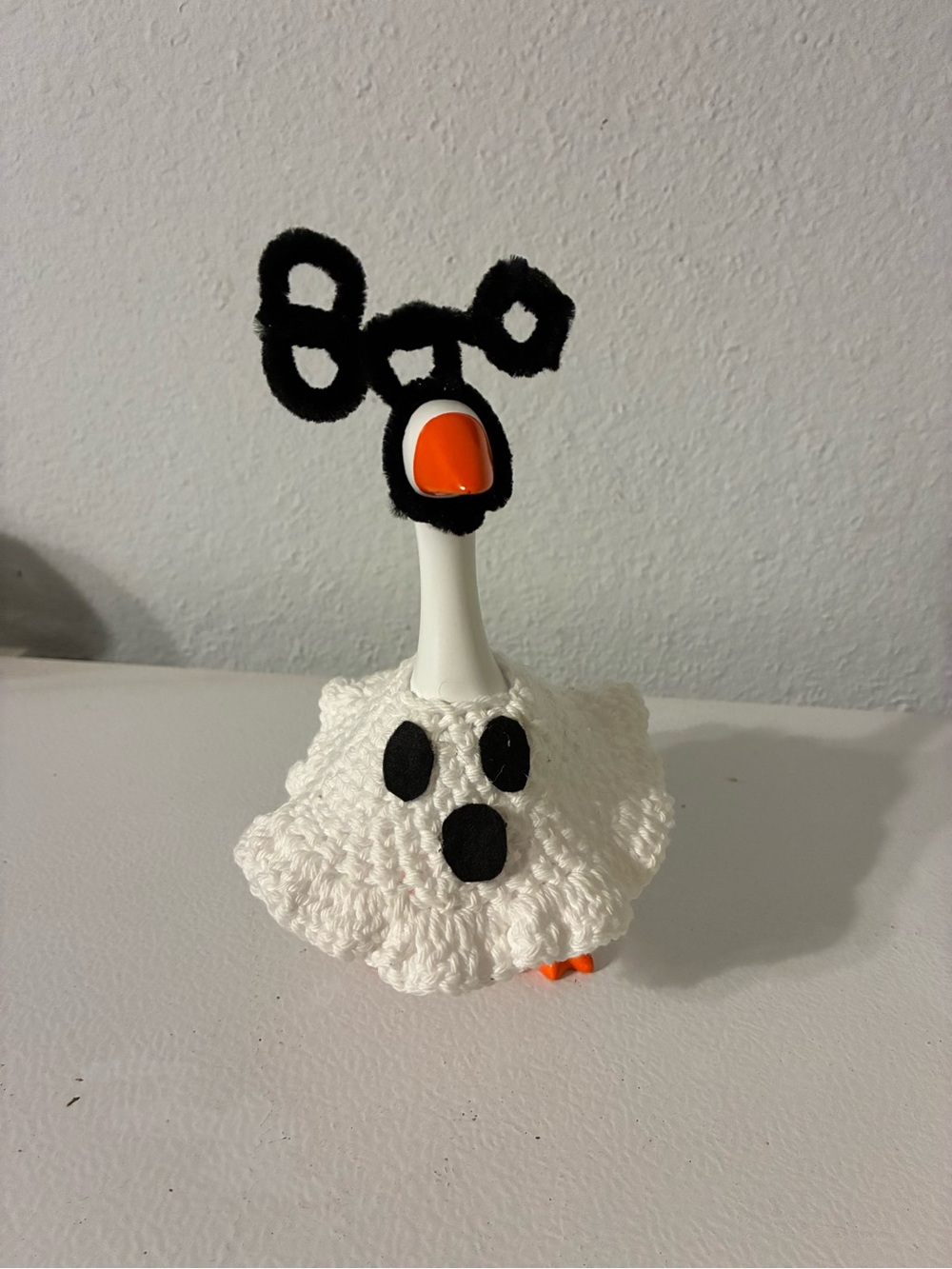 Handmade White Crochet Ghost Table Accent with Orange Beak